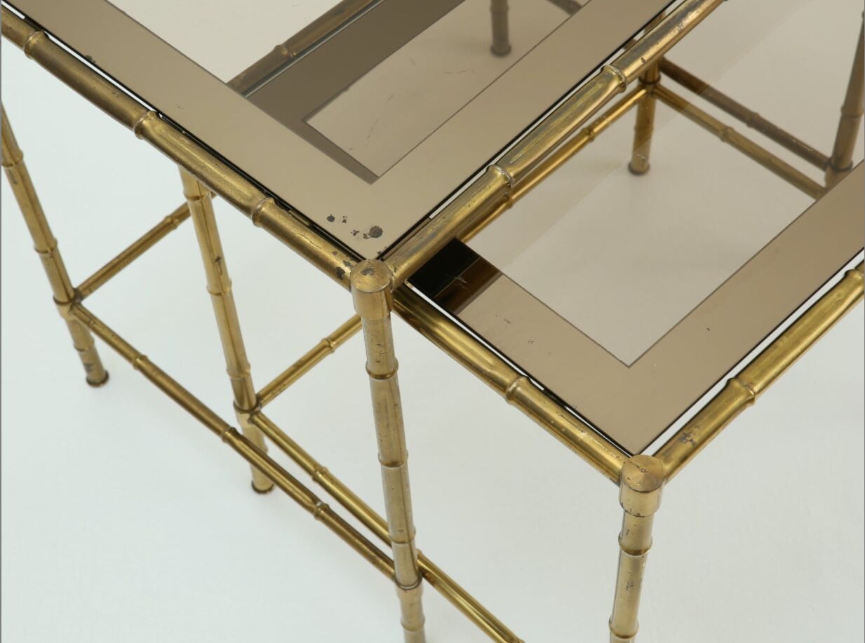 Brass and smoked glass tables