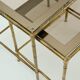 Brass and smoked glass tables