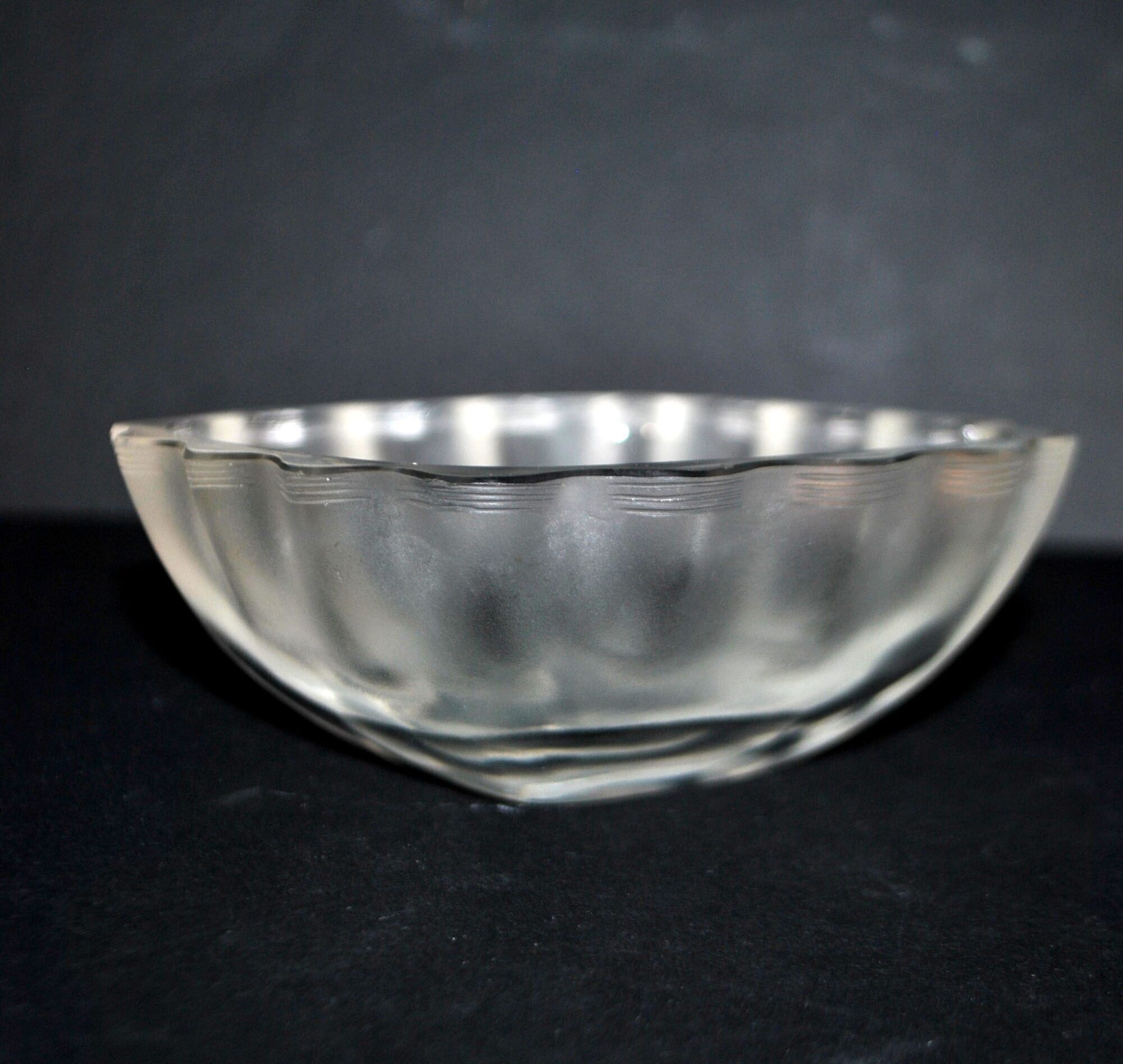Lalique glass ashtray bowl with frosted finish, engraved with wave design, signed Lalique.