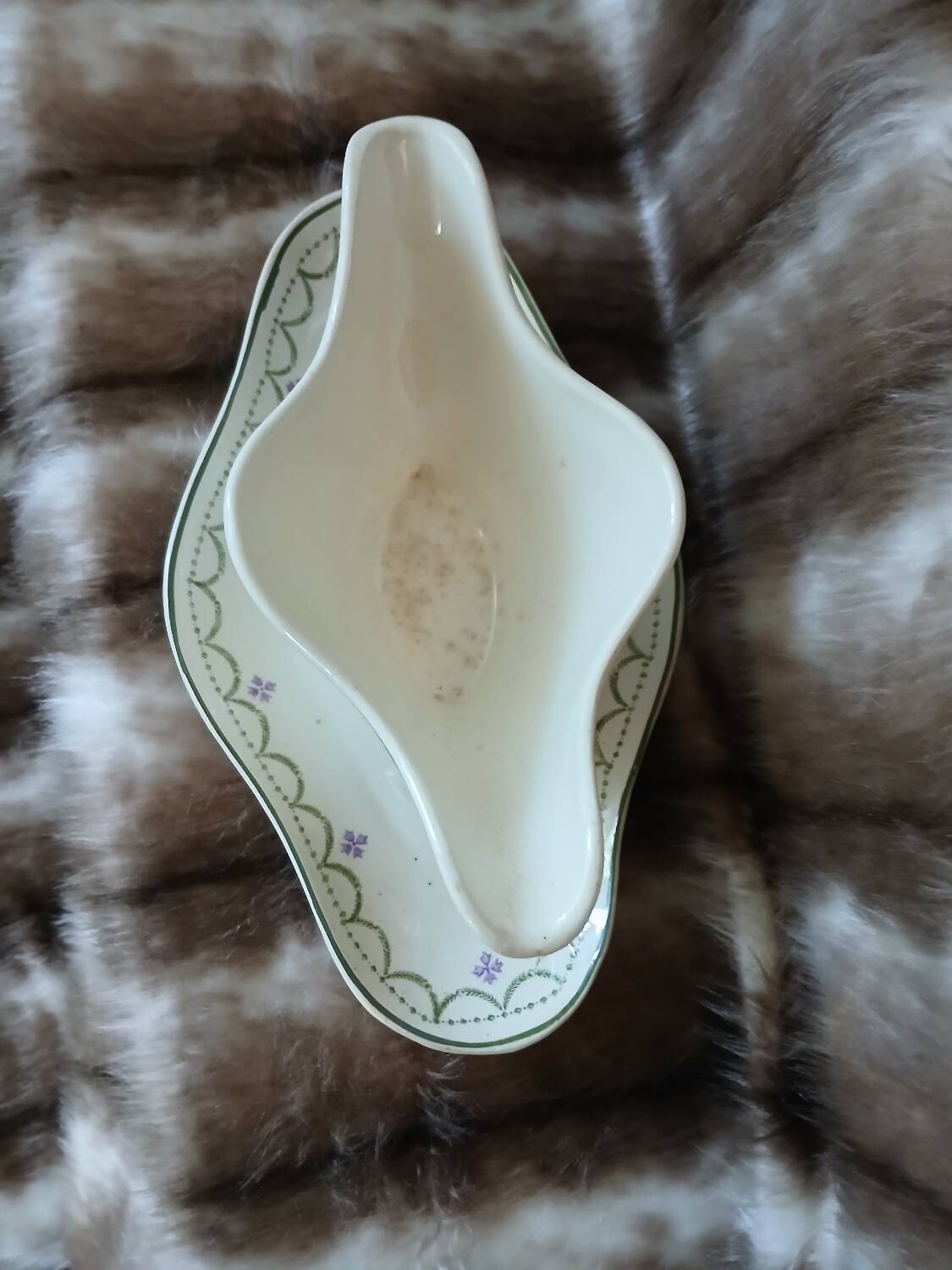 Antique sauce boat in Longwy ironstone.