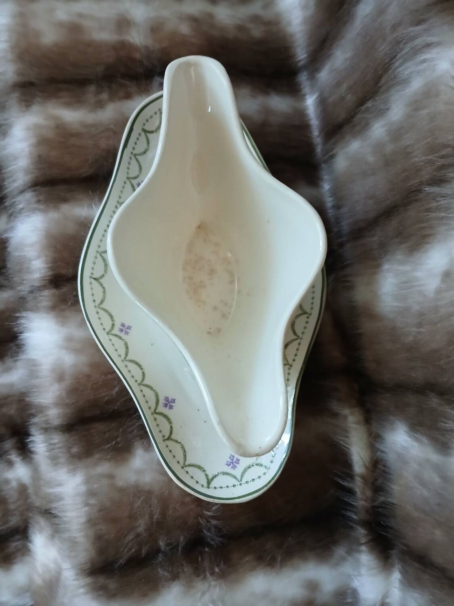 Antique sauce boat in Longwy ironstone.