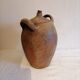 Old jar, glazed sandstone jug. Early twentieth century.