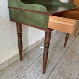 Wooden dressing table with olive green chair and floral patterns