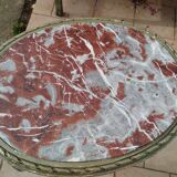 Old oval table with marble top, Louis XVI style