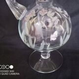 Wine carafe on foot, in cut and enameled glass