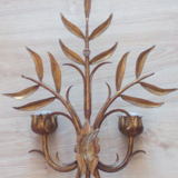 Floral applique in 1950s gold metal