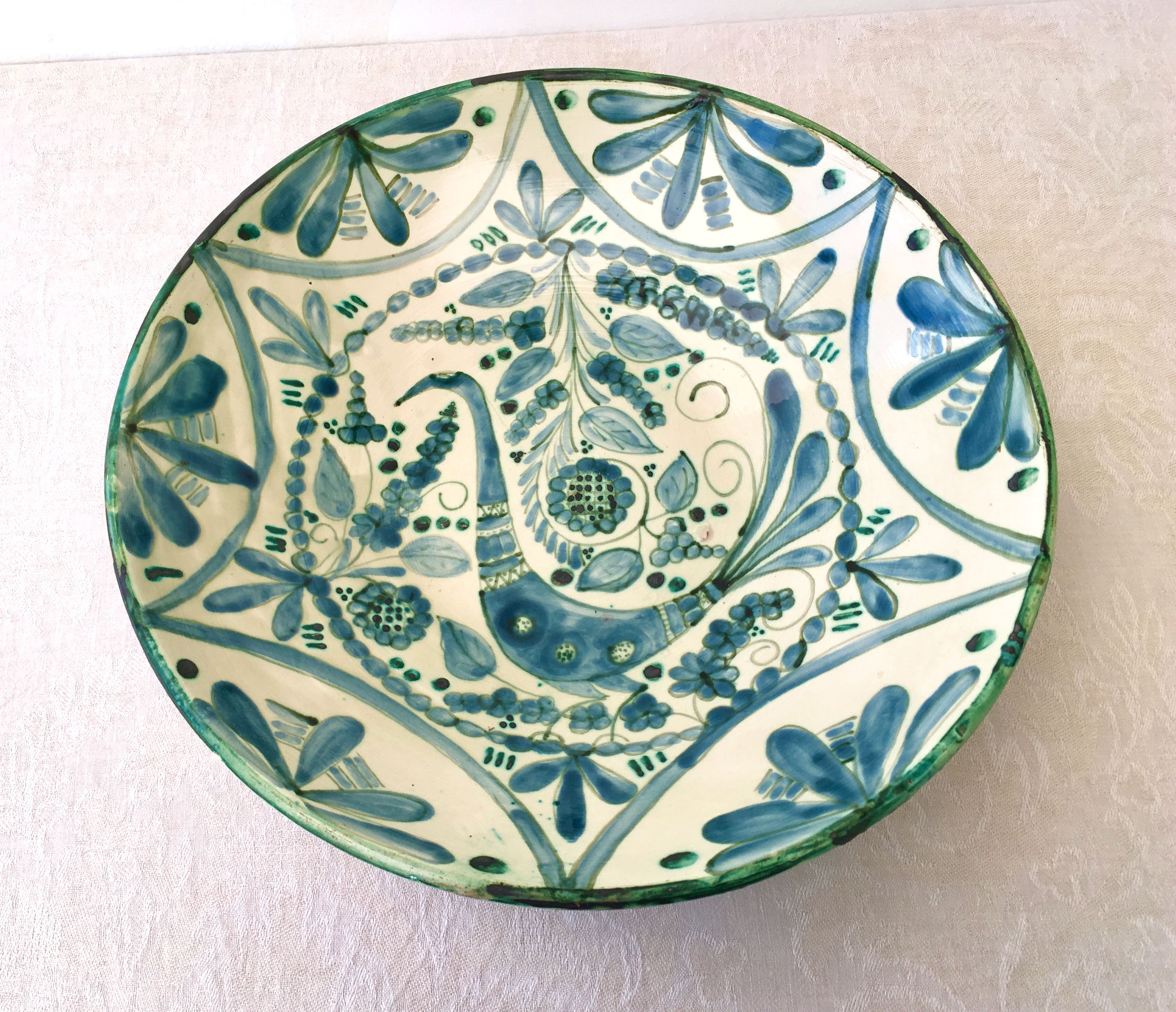 Large ceramic fruit cup with blue peacock