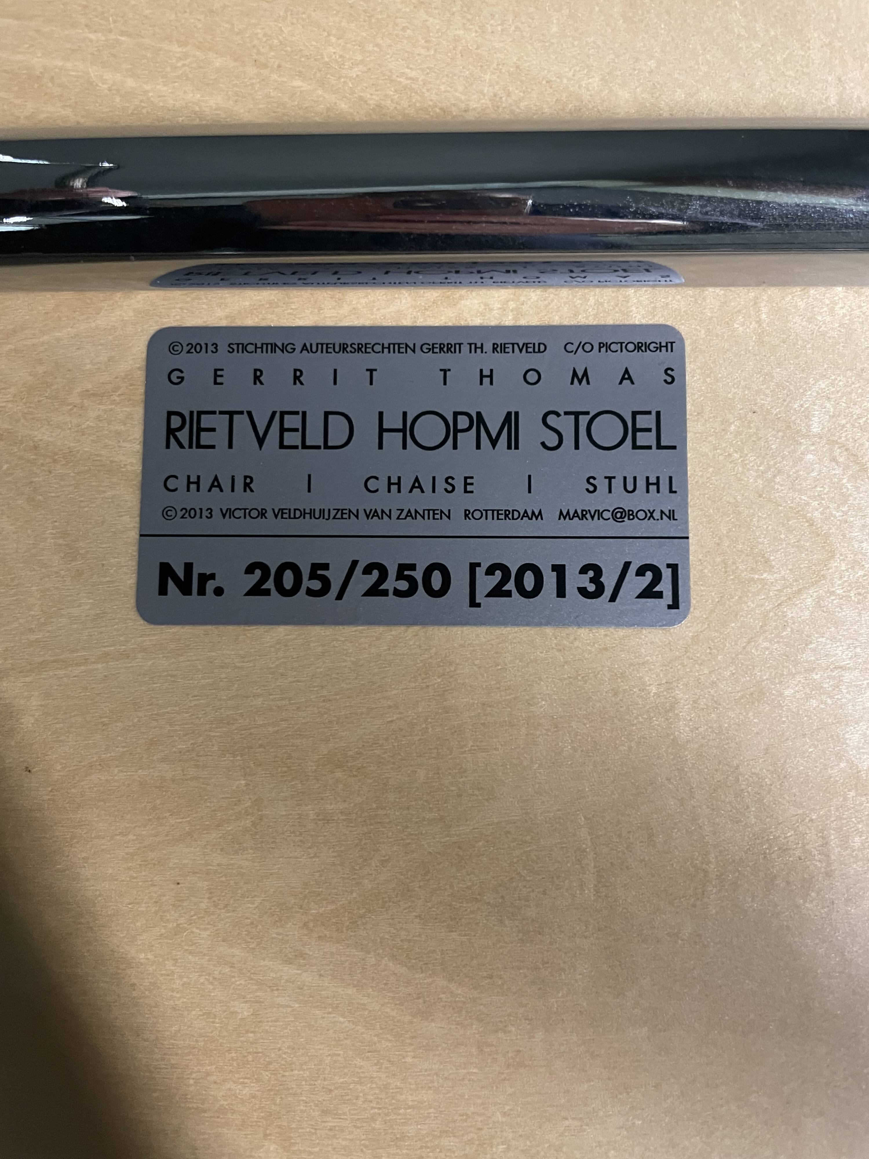 A pair of Gerrit Thomas Rietveld Hopmi chairs