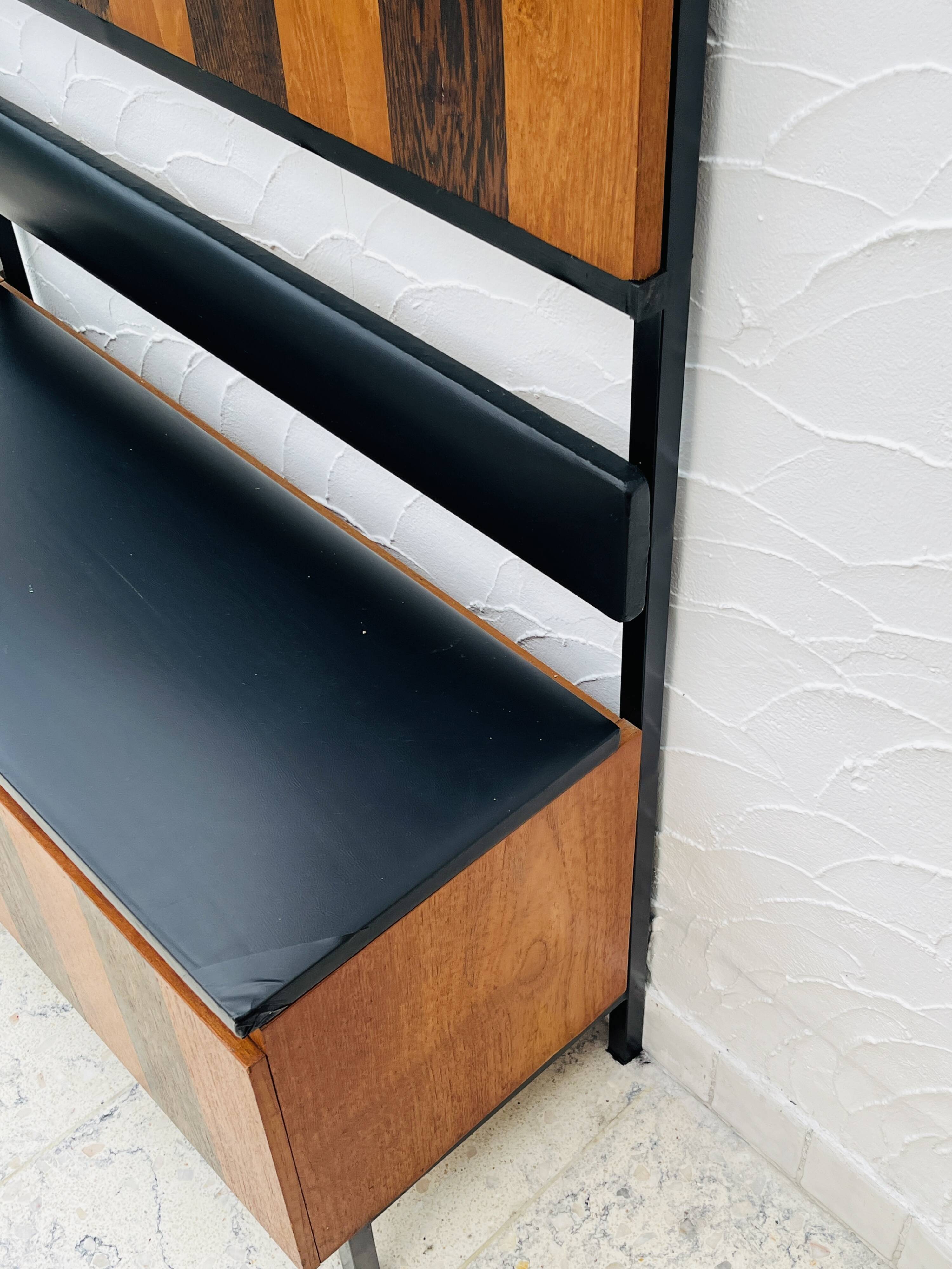 Vintage wall coat rack with storage bench from the 1970s.