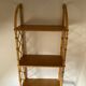 Vintage vertical wall mounted rattan shelf