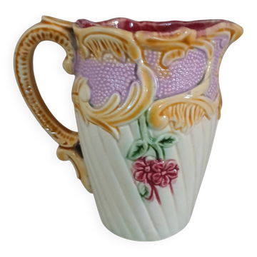 Small antique jug in slipware.