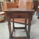Small stool, side table or bedside table in solid wood with turned legs.