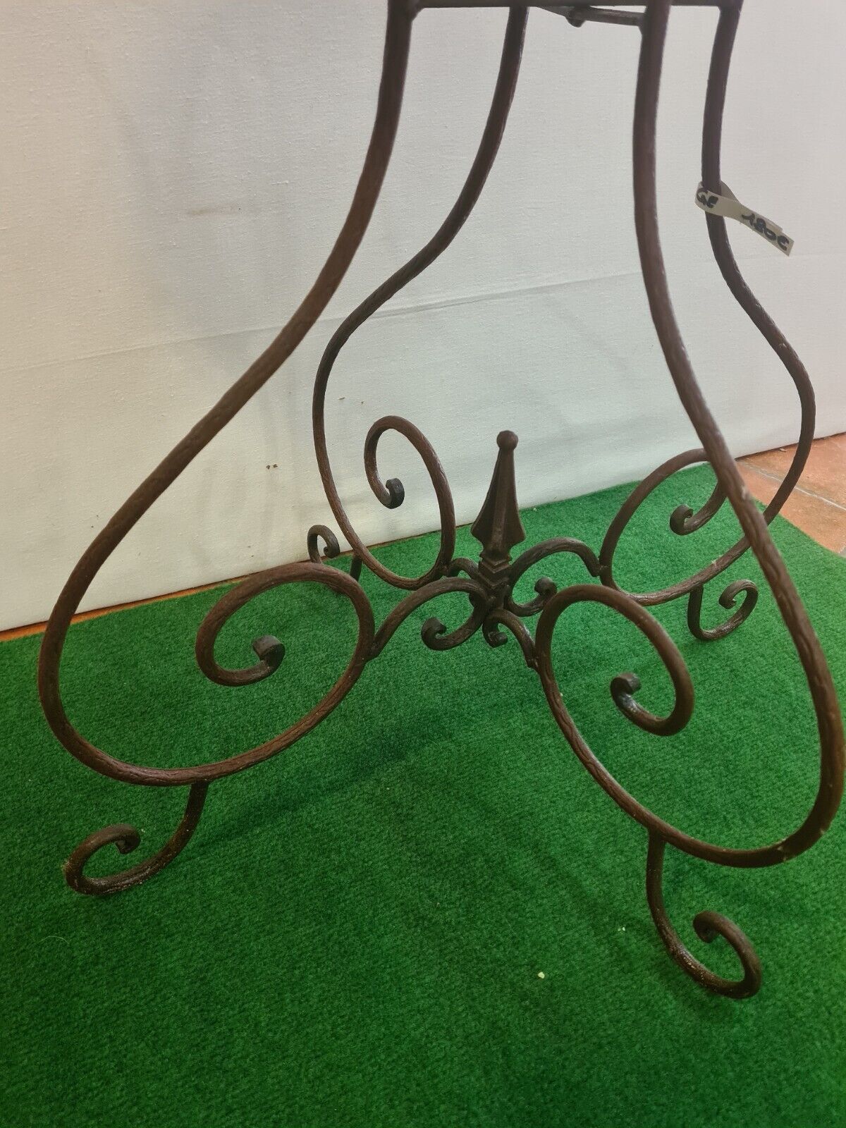 Wrought iron pedestal table