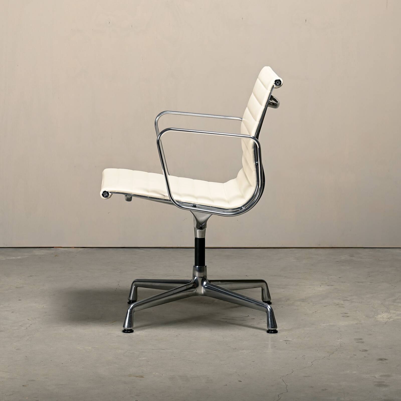 Charles & Ray Eames EA108 Dining Chair in Polished Aluminum and White leath