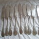 Ens. from 9 fish knives met. argente 1st title "au bon marche" mod.coquille