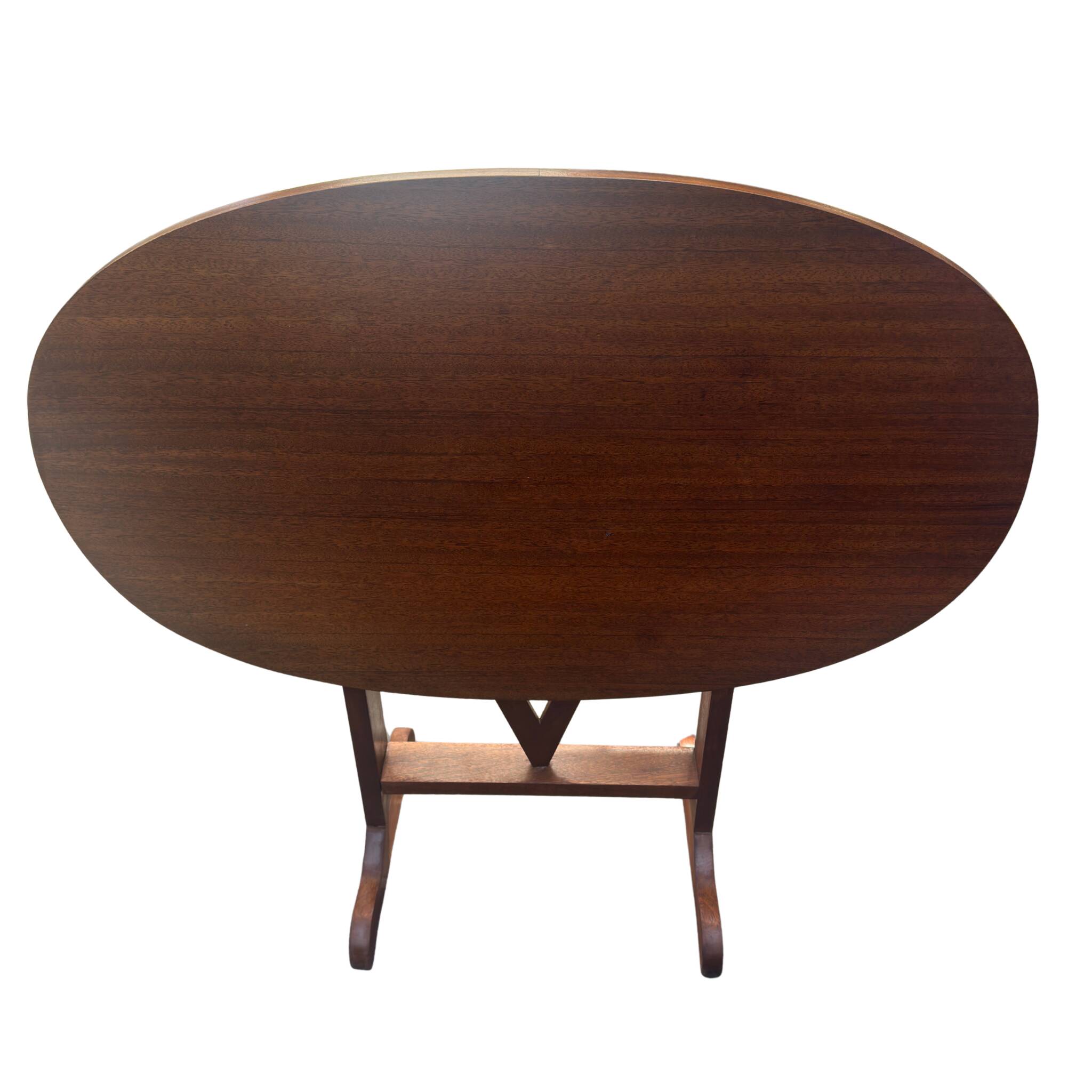 Oval folding table – mahogany veneer – V-shaped base – France, circa 1970