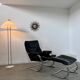 Old armchair and ottoman black leather tubular chrome bauhaus design from the 70s