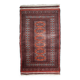 Tapis Vintage Bukhara en Laine, Années 1960, Authenticité et Tradition