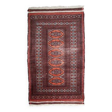 Tapis Vintage Bukhara en Laine, Années 1960, Authenticité et Tradition