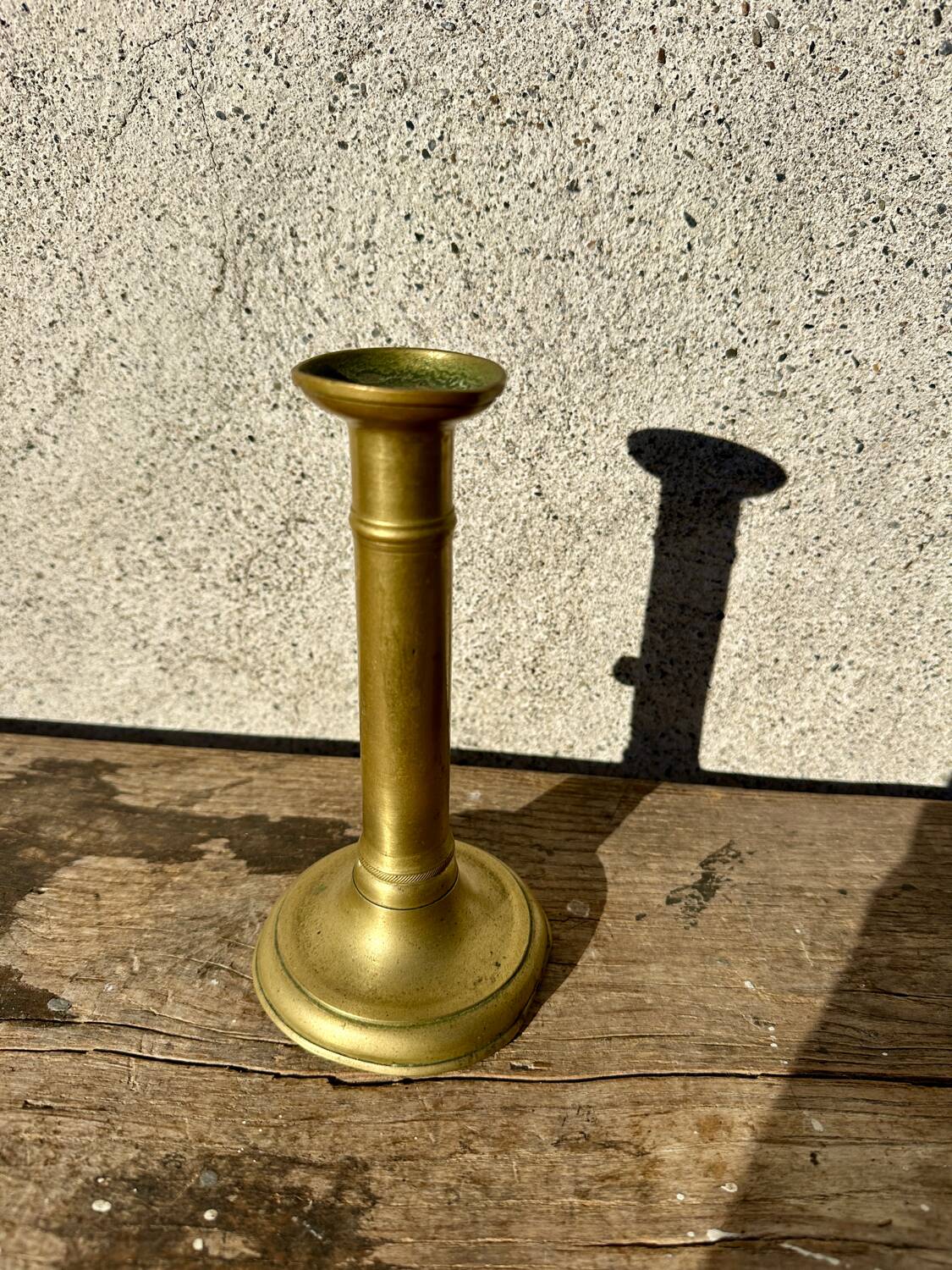 Antique brass candlestick with push button, candlestick.