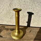Antique brass candlestick with push button, candlestick.