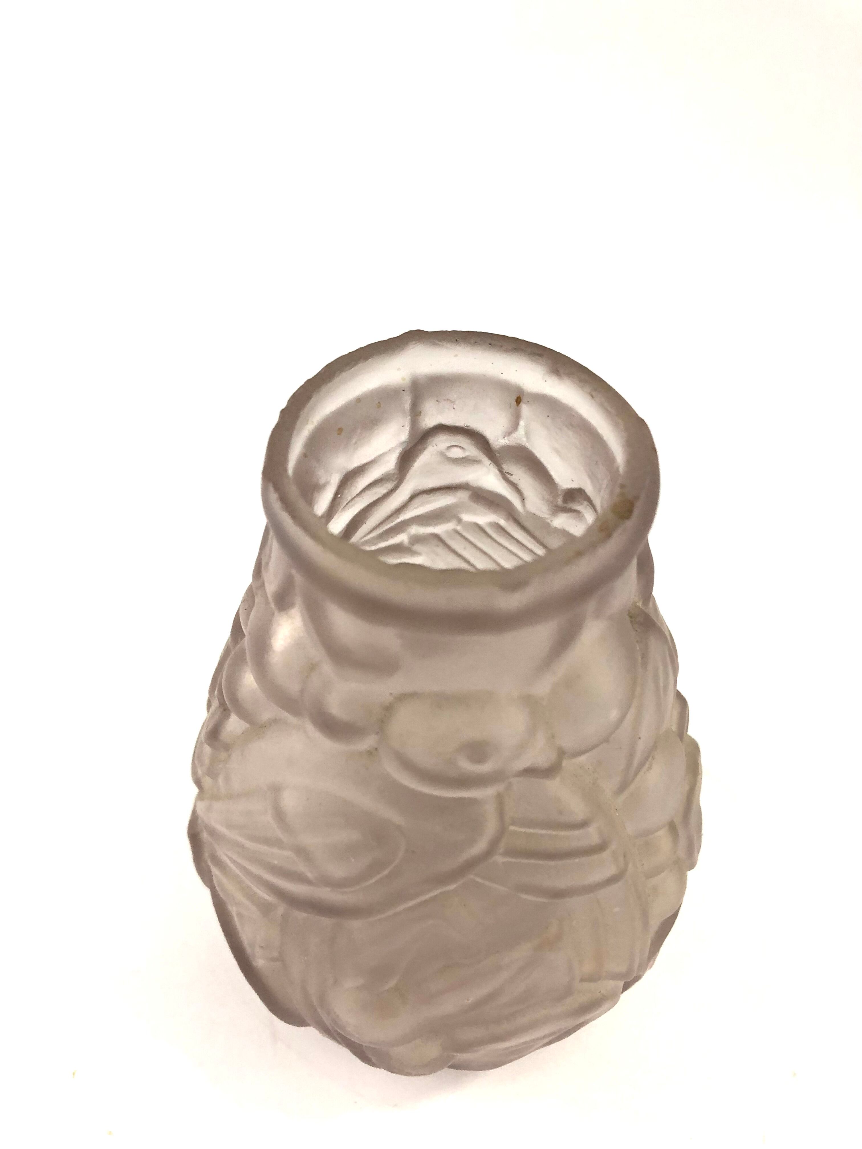 Art Deco vase in pink pressed glass with bird decoration