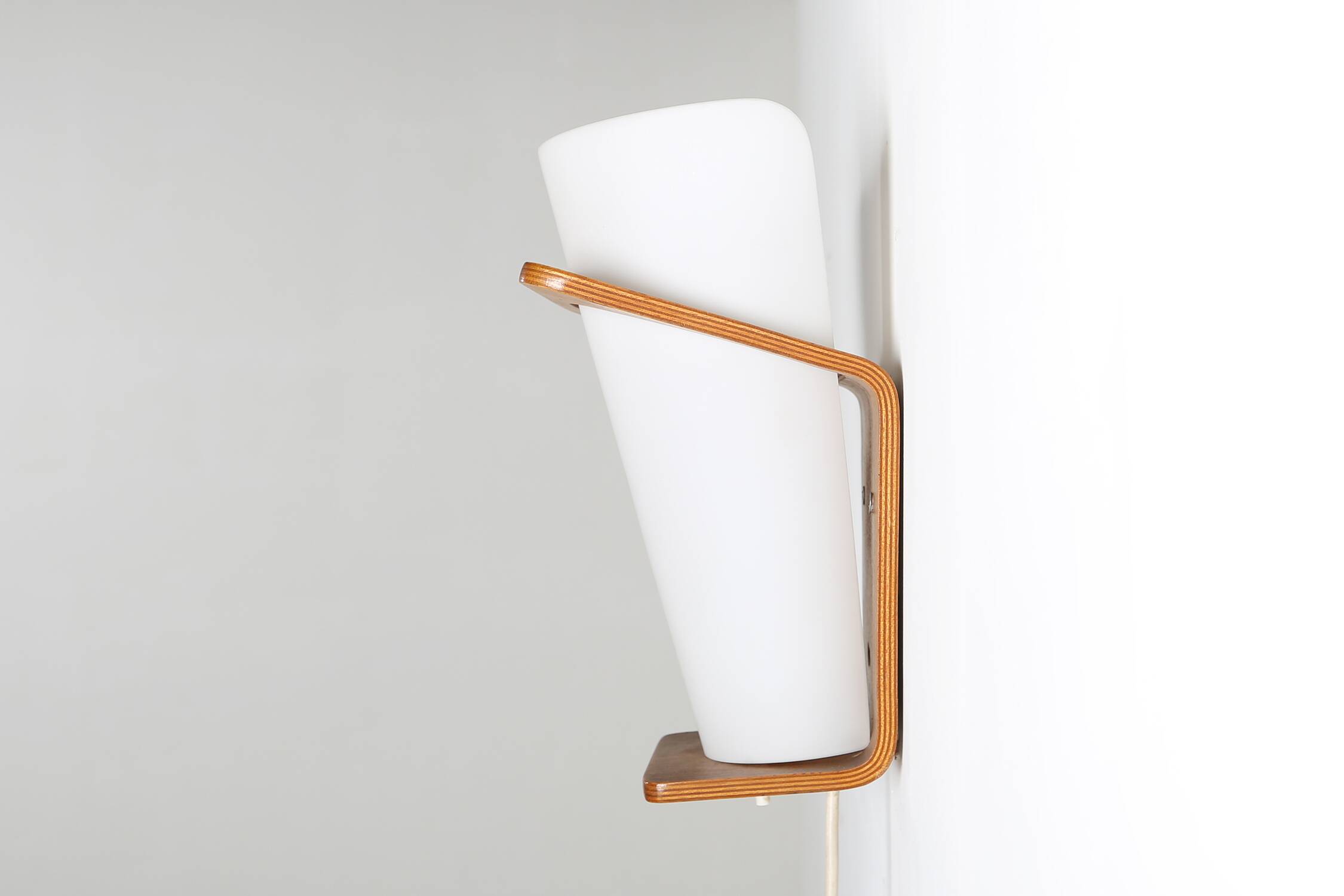 Wall lamp NX 41 by Louis Kalff for Philips in curved teak plywood, 1959