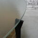 Vintage coffee table with glass top and rattan basket