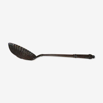Old sugar sprinkler spoon