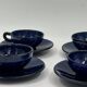 Set of 4 vintage ceramic cups and saucers, cobalt blue glaze.