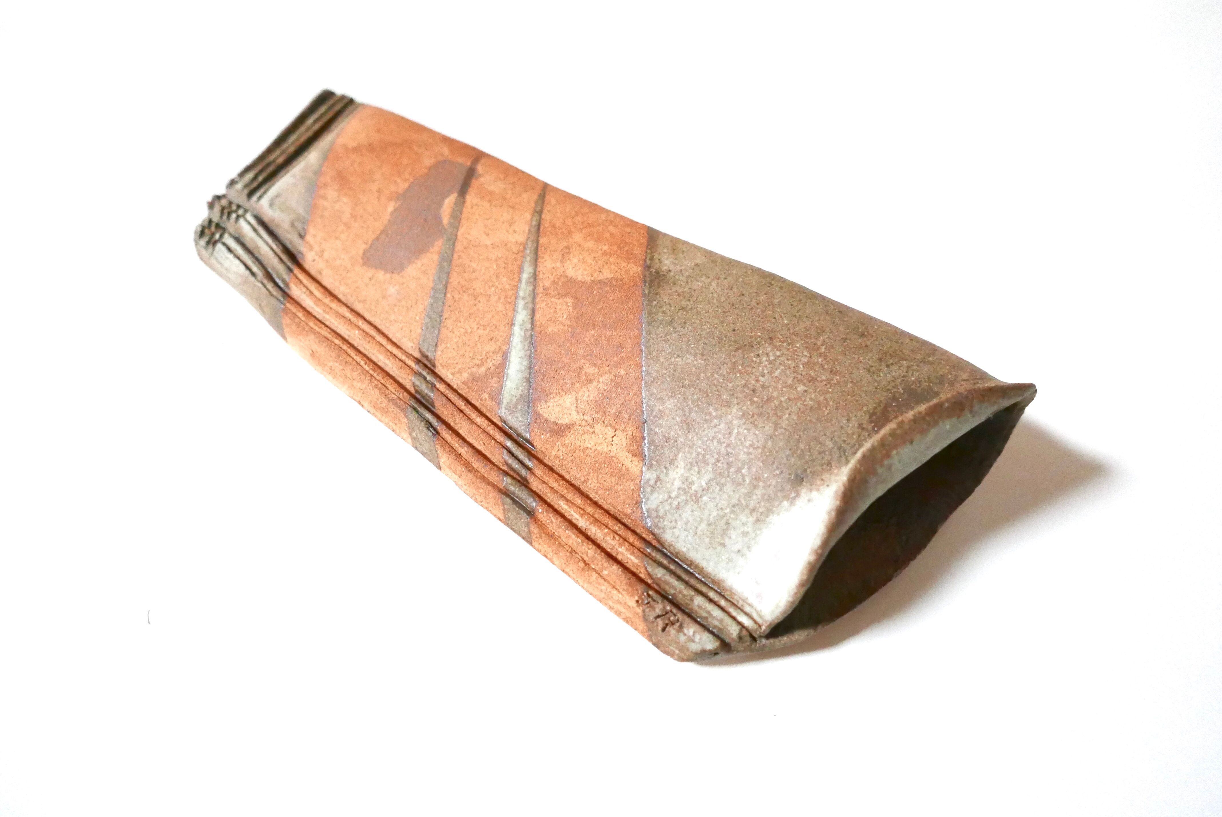 Signed sandstone wall vase, 70s