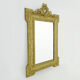 Old wall mirror in wood and gilded stucco, Louis XVI style. XIXth