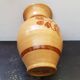 Beige ceramic vase with vintage brown flower decor