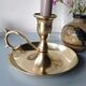 Thumb taper brass candlestick