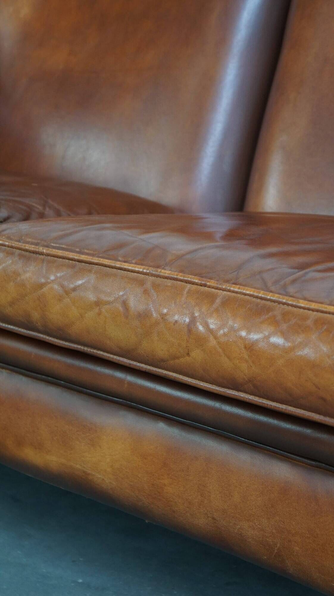Classic 2 seater sheepskin sofa with beautiful colours and good seating comfort