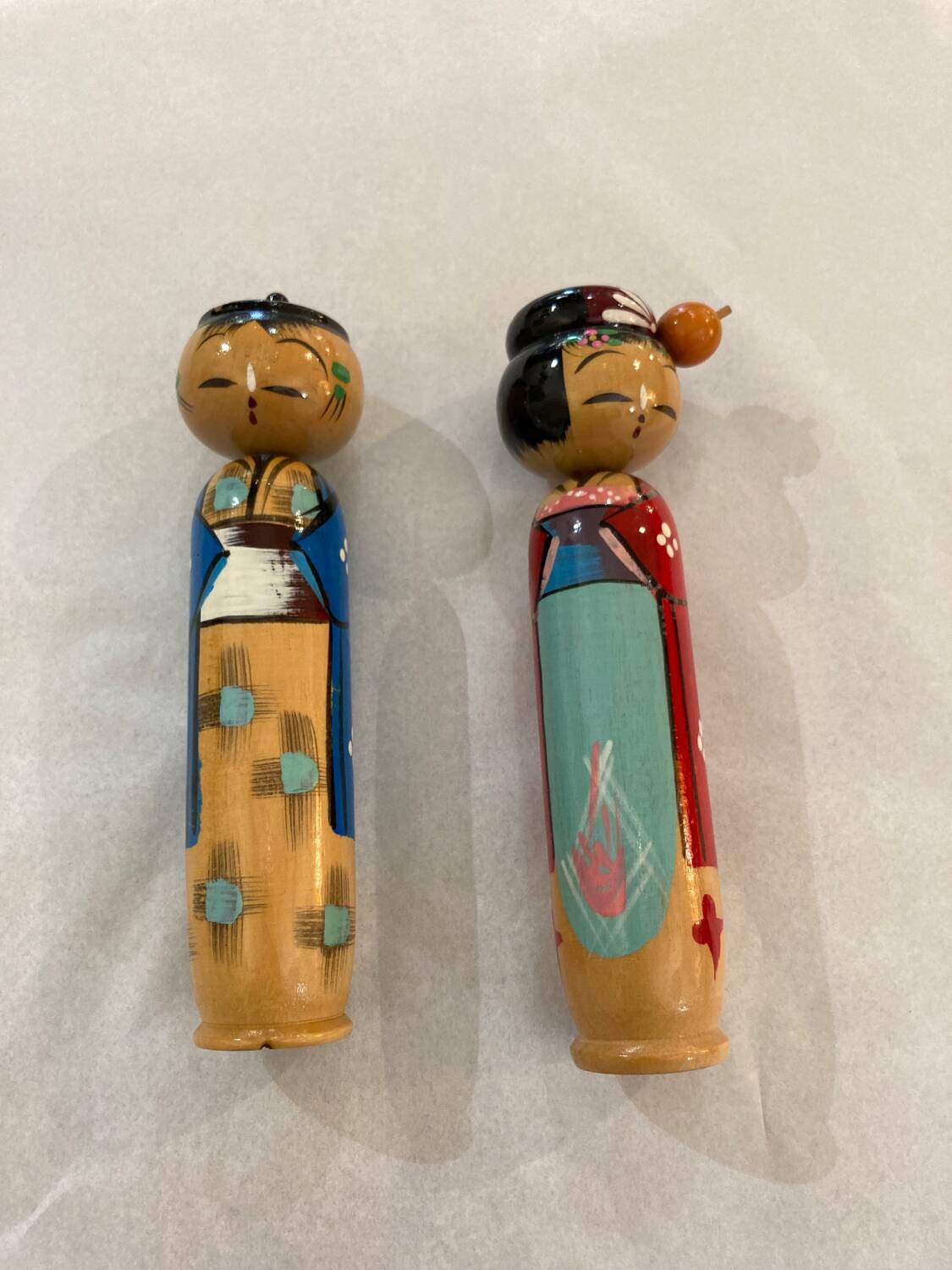 Pair of Kokeshi dolls