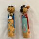 Pair of Kokeshi dolls