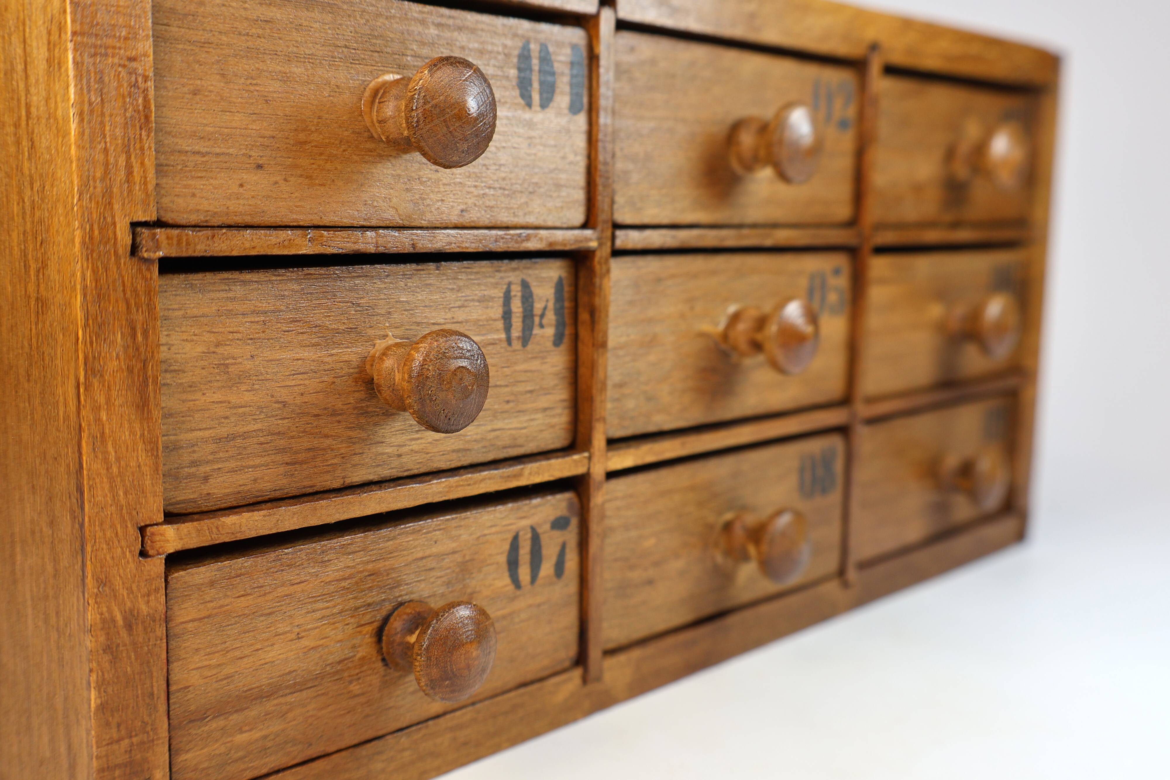 Small drawer unit, vintage wooden watchmaker's chest.
