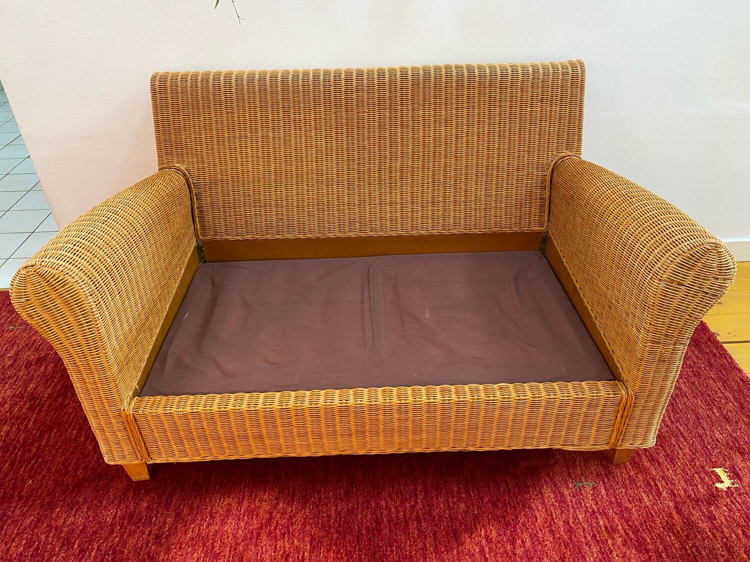 Antique 2-seater rattan sofa from the 70s