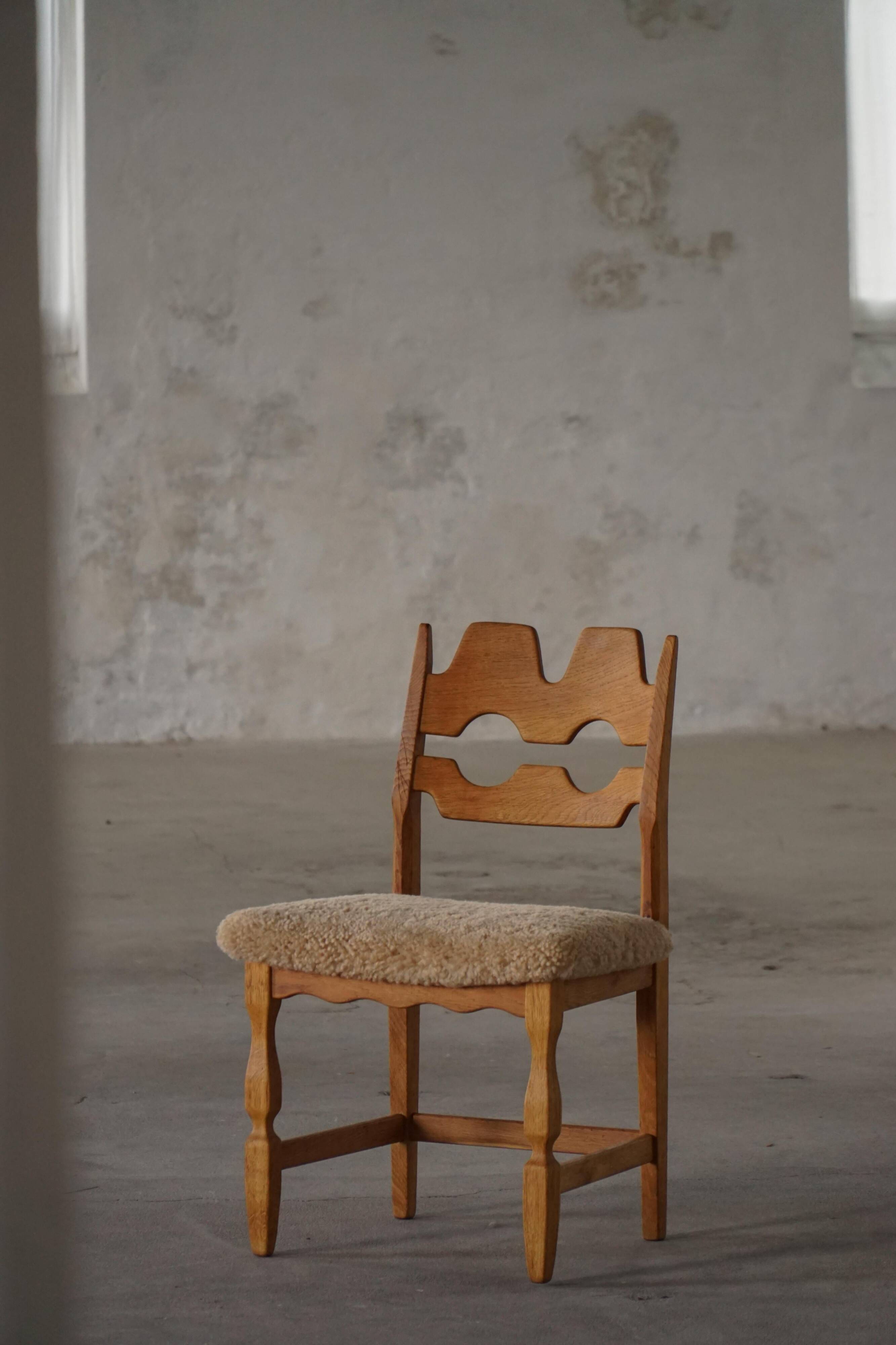 "Razorblade" dining chair by Henning Kjærnulf, in oak and lamb's wool, Denmark, 1960s.