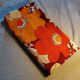 Nappe fleurs orange, 165x160 cm