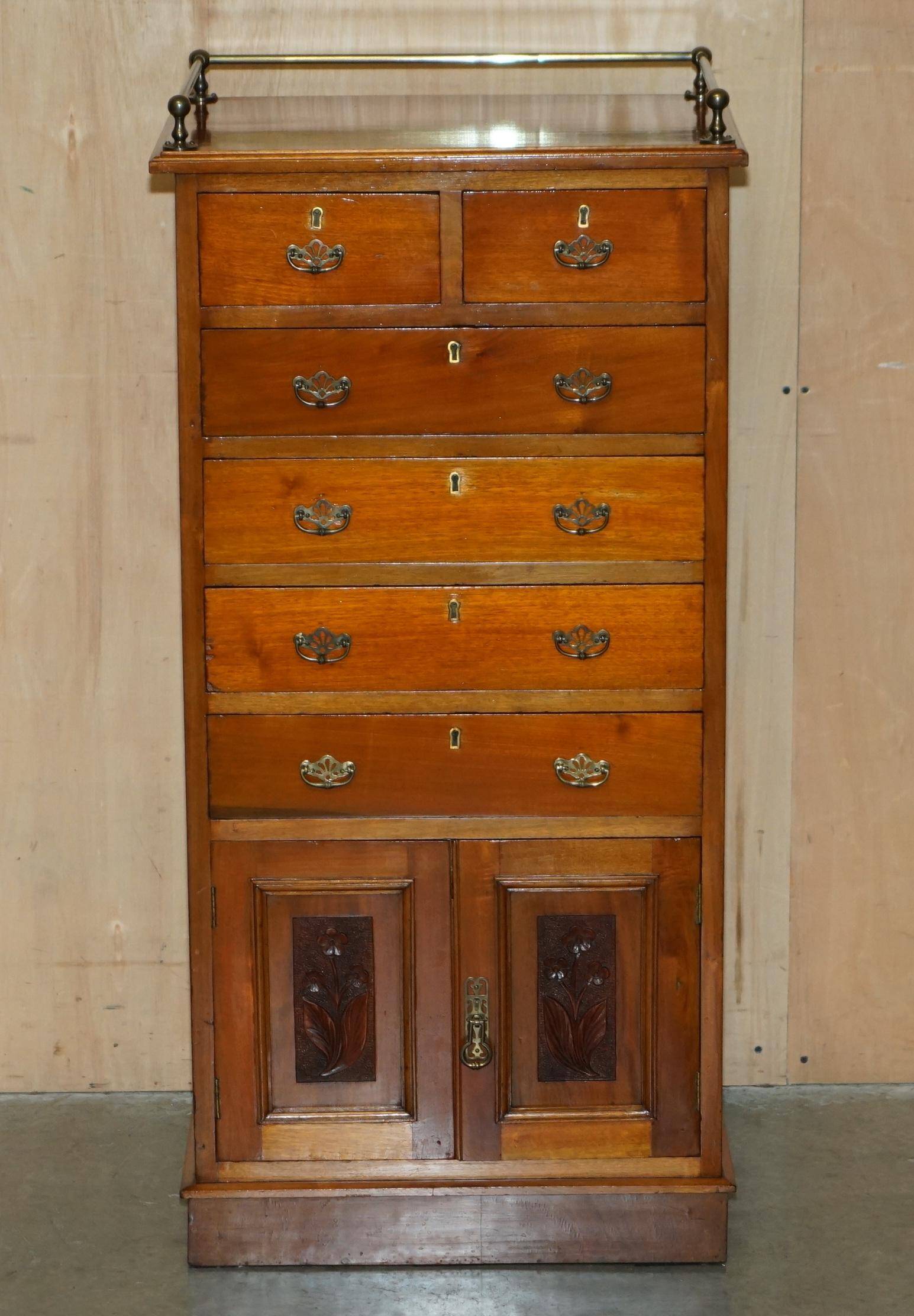 Victorian high chest of drawers in walnut with a bronze gallery.