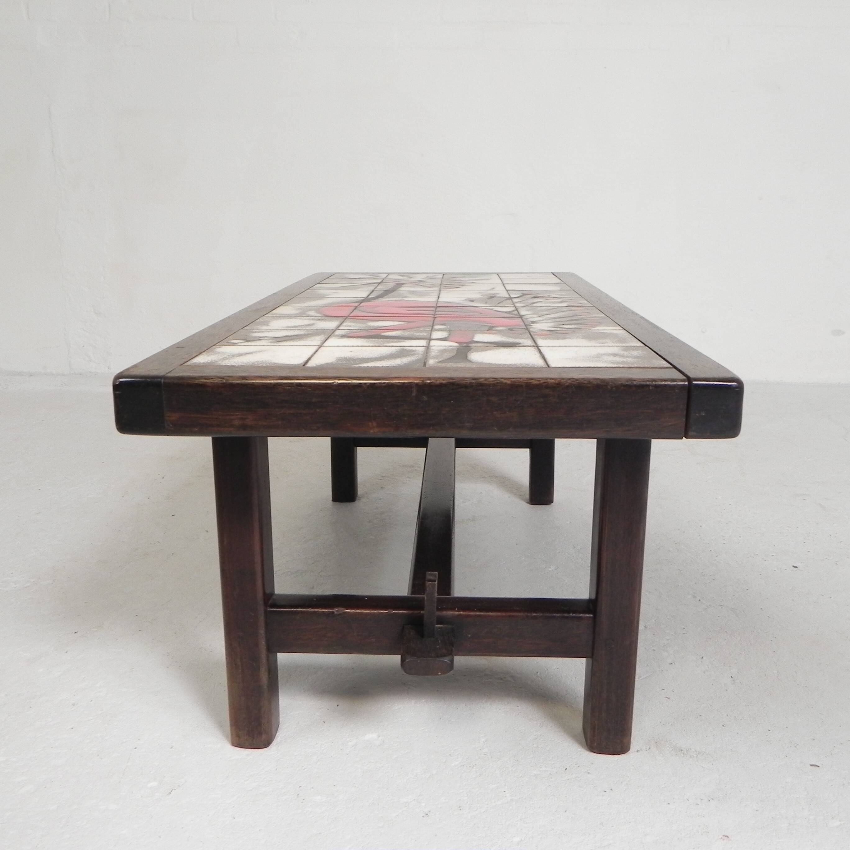 Square tile table from Vallauris, signed Dan with an image of a fantastic bird, 1960s.