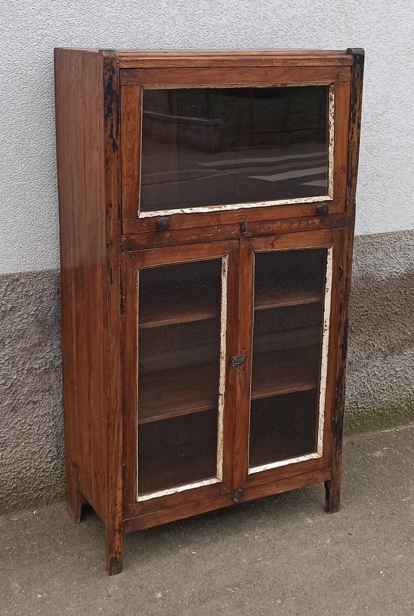 Small wooden glass cabinet with retractable door