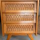 Vintage 1960s chest of drawers / chiffonnier with tapered legs and rattan.