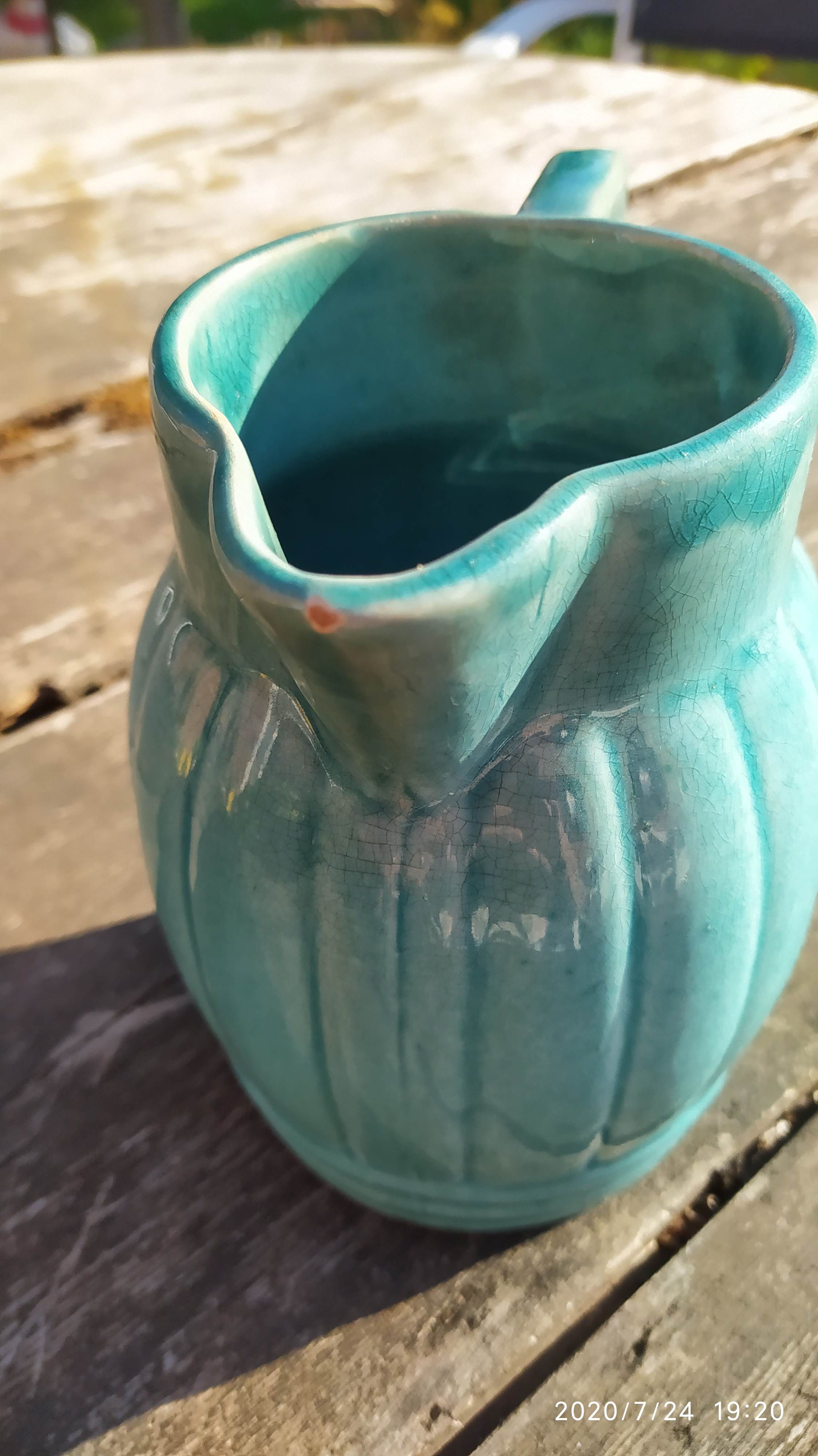 Old orchie ceramic pitcher