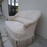 "Crapaud" bench in the richly decorated Napoleon III style.