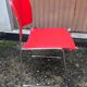 David Rowland red chair for Seid International Design