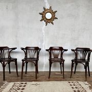 Série de 4 fauteuils vintage en bois courbé – Élégance intemporelle