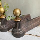 Pair of cast iron and brass chenets